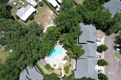 Nestled under the trees in a tranquil setting just off Ft Morgan on The Golf Club of the Wharf in Alabama - for sale on GolfHomes.com, golf home, golf lot