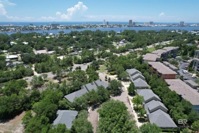 Nestled under the trees in a tranquil setting just off Ft Morgan on The Golf Club of the Wharf in Alabama - for sale on GolfHomes.com, golf home, golf lot