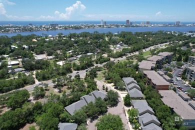 Nestled under the trees in a tranquil setting just off Ft Morgan on The Golf Club of the Wharf in Alabama - for sale on GolfHomes.com, golf home, golf lot