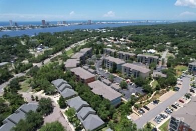 Nestled under the trees in a tranquil setting just off Ft Morgan on The Golf Club of the Wharf in Alabama - for sale on GolfHomes.com, golf home, golf lot