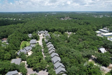 Nestled under the trees in a tranquil setting just off Ft Morgan on The Golf Club of the Wharf in Alabama - for sale on GolfHomes.com, golf home, golf lot