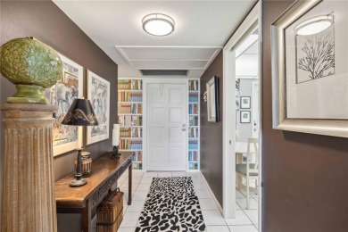 As you walk in, you're immediately struck by the breathtaking on Palm Aire Country Club of Sarasota in Florida - for sale on GolfHomes.com, golf home, golf lot