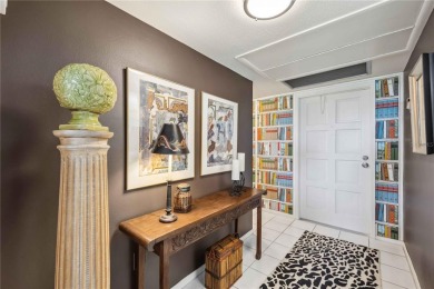 As you walk in, you're immediately struck by the breathtaking on Palm Aire Country Club of Sarasota in Florida - for sale on GolfHomes.com, golf home, golf lot