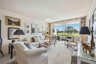 As you walk in, you're immediately struck by the breathtaking on Palm Aire Country Club of Sarasota in Florida - for sale on GolfHomes.com, golf home, golf lot