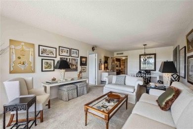 As you walk in, you're immediately struck by the breathtaking on Palm Aire Country Club of Sarasota in Florida - for sale on GolfHomes.com, golf home, golf lot