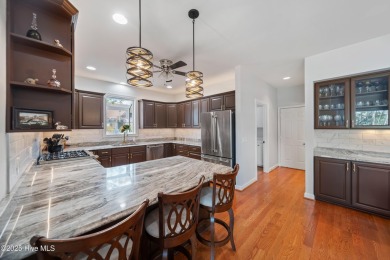 Welcome to this exquisite 4-bedroom, 3-bath golf cottage in the on Members Club At St. James Plantation in North Carolina - for sale on GolfHomes.com, golf home, golf lot