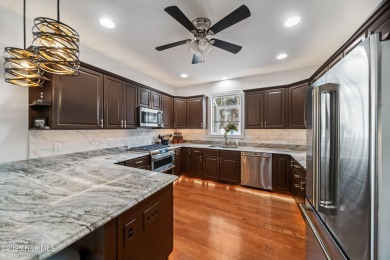 Welcome to this exquisite 4-bedroom, 3-bath golf cottage in the on Members Club At St. James Plantation in North Carolina - for sale on GolfHomes.com, golf home, golf lot