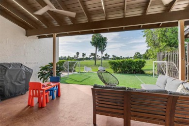 Stunning corner 2/2 townhome located in the desirable Country on Country Club of Miami in Florida - for sale on GolfHomes.com, golf home, golf lot
