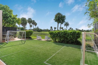 Stunning corner 2/2 townhome located in the desirable Country on Country Club of Miami in Florida - for sale on GolfHomes.com, golf home, golf lot