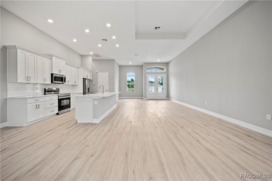 2025 NEW BUILD, this custom updated Genesis Model from Commence on Southern Woods Golf Club in Florida - for sale on GolfHomes.com, golf home, golf lot