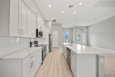 2025 NEW BUILD, this custom updated Genesis Model from Commence on Southern Woods Golf Club in Florida - for sale on GolfHomes.com, golf home, golf lot