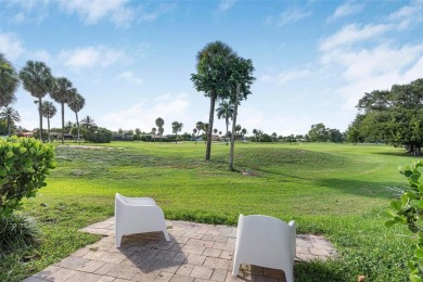 Stunning corner 2/2 townhome located in the desirable Country on Country Club of Miami in Florida - for sale on GolfHomes.com, golf home, golf lot