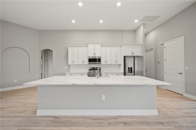 2025 NEW BUILD, this custom updated Genesis Model from Commence on Southern Woods Golf Club in Florida - for sale on GolfHomes.com, golf home, golf lot