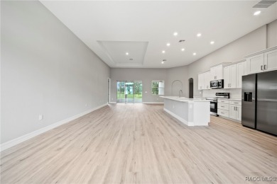 2025 NEW BUILD, this custom updated Genesis Model from Commence on Southern Woods Golf Club in Florida - for sale on GolfHomes.com, golf home, golf lot