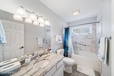 Welcome to this exquisite 4-bedroom, 3-bath golf cottage in the on Members Club At St. James Plantation in North Carolina - for sale on GolfHomes.com, golf home, golf lot