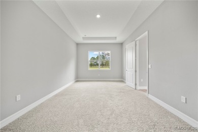 2025 NEW BUILD, this custom updated Genesis Model from Commence on Southern Woods Golf Club in Florida - for sale on GolfHomes.com, golf home, golf lot