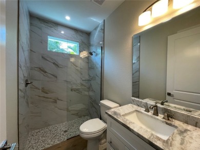 Stunning New Construction Pool Home in Southwest Cape Coral! 3 on Royal Tee Country Club in Florida - for sale on GolfHomes.com, golf home, golf lot