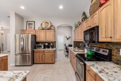 Beautiful home located in The Estates in the Johnson Ranch Golf on The Golf Club At Johnson Ranch in Arizona - for sale on GolfHomes.com, golf home, golf lot