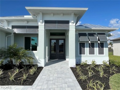 Stunning New Construction Pool Home in Southwest Cape Coral! 3 on Royal Tee Country Club in Florida - for sale on GolfHomes.com, golf home, golf lot