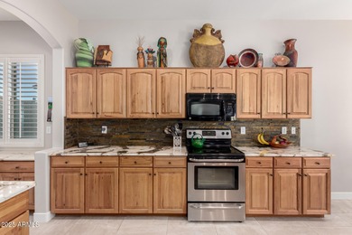 Beautiful home located in The Estates in the Johnson Ranch Golf on The Golf Club At Johnson Ranch in Arizona - for sale on GolfHomes.com, golf home, golf lot