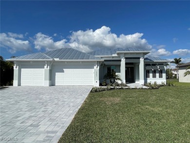 Stunning New Construction Pool Home in Southwest Cape Coral! 3 on Royal Tee Country Club in Florida - for sale on GolfHomes.com, golf home, golf lot