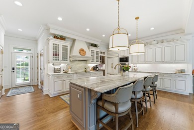 BOASTING PALATIAL, CLASSICAL ARCHITECTURE, THIS ONE-OF-A-KIND on TPC At Sugarloaf Golf Club in Georgia - for sale on GolfHomes.com, golf home, golf lot