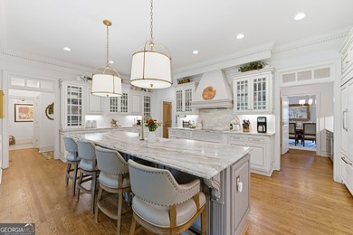 BOASTING PALATIAL, CLASSICAL ARCHITECTURE, THIS ONE-OF-A-KIND on TPC At Sugarloaf Golf Club in Georgia - for sale on GolfHomes.com, golf home, golf lot