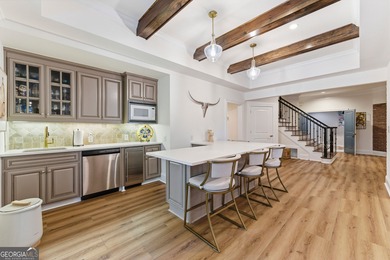 BOASTING PALATIAL, CLASSICAL ARCHITECTURE, THIS ONE-OF-A-KIND on TPC At Sugarloaf Golf Club in Georgia - for sale on GolfHomes.com, golf home, golf lot