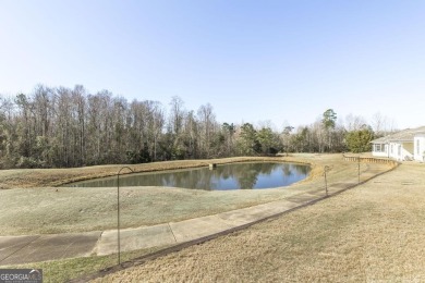 Welcome Home to 315 Pebble Beach Drive - A Golf Course Retreat! on Houston Springs Resort and Golf Course in Georgia - for sale on GolfHomes.com, golf home, golf lot