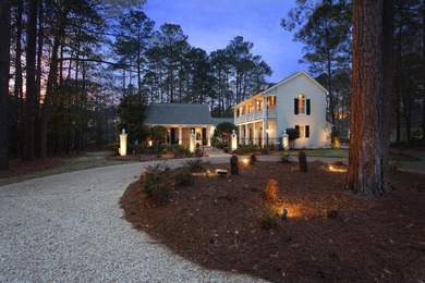 This charming Southern residence is gracefully set behind a on Canebrake Country Club in Mississippi - for sale on GolfHomes.com, golf home, golf lot