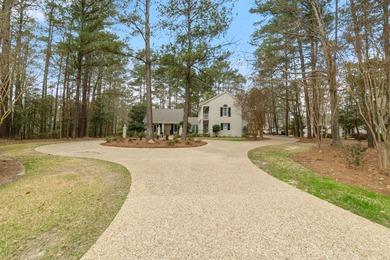 This charming Southern residence is gracefully set behind a on Canebrake Country Club in Mississippi - for sale on GolfHomes.com, golf home, golf lot