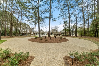 This charming Southern residence is gracefully set behind a on Canebrake Country Club in Mississippi - for sale on GolfHomes.com, golf home, golf lot