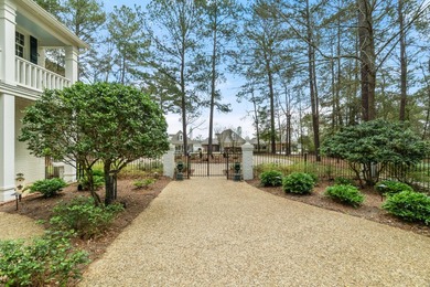 This charming Southern residence is gracefully set behind a on Canebrake Country Club in Mississippi - for sale on GolfHomes.com, golf home, golf lot