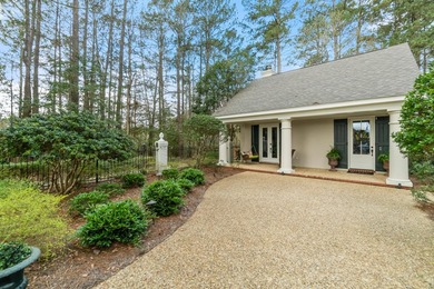 This charming Southern residence is gracefully set behind a on Canebrake Country Club in Mississippi - for sale on GolfHomes.com, golf home, golf lot