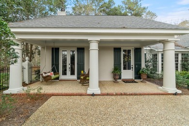 This charming Southern residence is gracefully set behind a on Canebrake Country Club in Mississippi - for sale on GolfHomes.com, golf home, golf lot