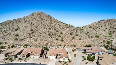 Beautiful home located in The Estates in the Johnson Ranch Golf on The Golf Club At Johnson Ranch in Arizona - for sale on GolfHomes.com, golf home, golf lot