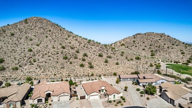 Beautiful home located in The Estates in the Johnson Ranch Golf on The Golf Club At Johnson Ranch in Arizona - for sale on GolfHomes.com, golf home, golf lot