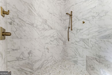 BOASTING PALATIAL, CLASSICAL ARCHITECTURE, THIS ONE-OF-A-KIND on TPC At Sugarloaf Golf Club in Georgia - for sale on GolfHomes.com, golf home, golf lot