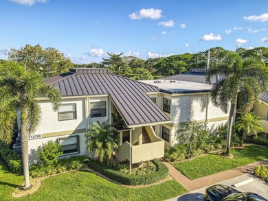 Step into this bright, move-in-ready 2BR/2BA condo in the heart on Old Marsh Golf Club in Florida - for sale on GolfHomes.com, golf home, golf lot