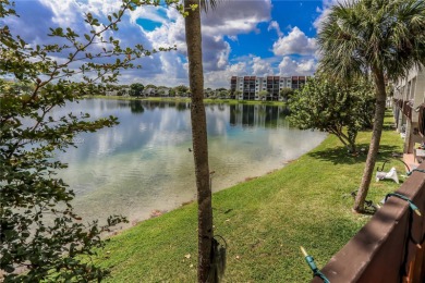 Indulge in the epitome of lakeside living with this exquisite on Fontainebleau Golf Course in Florida - for sale on GolfHomes.com, golf home, golf lot