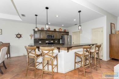 Effortless and elegant golf-course living in the SPI Golf on South Padre Island Golf Club in Texas - for sale on GolfHomes.com, golf home, golf lot