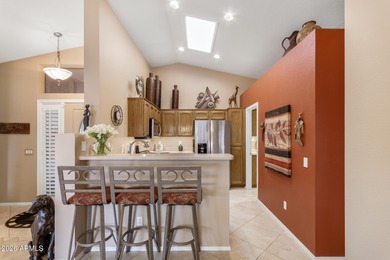 Impeccably maintained 2-bedroom, 2-bathroom Doral model home on Tuscany Falls At Pebble Creek in Arizona - for sale on GolfHomes.com, golf home, golf lot