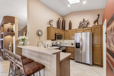 Impeccably maintained 2-bedroom, 2-bathroom Doral model home on Tuscany Falls At Pebble Creek in Arizona - for sale on GolfHomes.com, golf home, golf lot