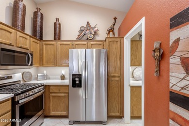 Impeccably maintained 2-bedroom, 2-bathroom Doral model home on Tuscany Falls At Pebble Creek in Arizona - for sale on GolfHomes.com, golf home, golf lot