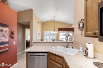 Impeccably maintained 2-bedroom, 2-bathroom Doral model home on Tuscany Falls At Pebble Creek in Arizona - for sale on GolfHomes.com, golf home, golf lot