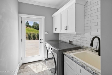 Perched on a hill, this stunning 4 BR, 2.5 BA home is better on Landmark Golf Club At Avalon in Tennessee - for sale on GolfHomes.com, golf home, golf lot