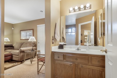 Impeccably maintained 2-bedroom, 2-bathroom Doral model home on Tuscany Falls At Pebble Creek in Arizona - for sale on GolfHomes.com, golf home, golf lot