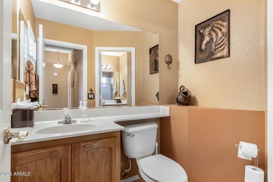 Impeccably maintained 2-bedroom, 2-bathroom Doral model home on Tuscany Falls At Pebble Creek in Arizona - for sale on GolfHomes.com, golf home, golf lot