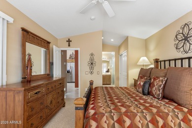 Impeccably maintained 2-bedroom, 2-bathroom Doral model home on Tuscany Falls At Pebble Creek in Arizona - for sale on GolfHomes.com, golf home, golf lot