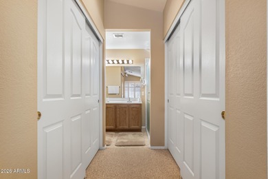 Impeccably maintained 2-bedroom, 2-bathroom Doral model home on Tuscany Falls At Pebble Creek in Arizona - for sale on GolfHomes.com, golf home, golf lot